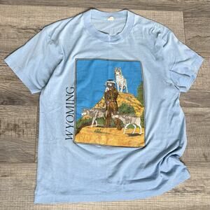 Vtg 90s Wyoming TShirt Size Large Screen Star USA Faded Light Blue Frontier Wolf
